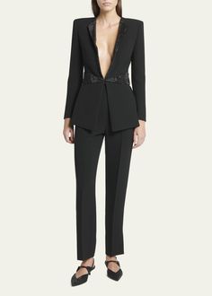 Luxury Long Sleeve Formal Pantsuit, Luxury Evening Pantsuit For Fall, Luxury Suits For Evening, Elegant Long Sleeve Evening Suits, Evening Pantsuit With Suit Collar For Fall, Fall Evening Pantsuit With Suit Collar, Designer Evening Suits For Fall, Formal Long Sleeve Pantsuit With Structured Boning, Elegant Embellished Outerwear For Work