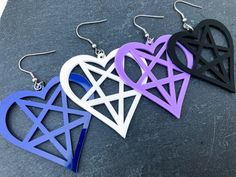 Silver hook earrings featuring a large heartagram acrylic pendant. Looks amazing on normal and stretched ears (with flesh tunnels or without). Available in 4 colors. ✦ Product details * Length 7cm | Width 5.5cm ✦ Colors * Please note that monitors and screens all display color and brightness a bit differently. ☽ Jewelry Care * Keep your jewelry safe in an organza or velvet bag, stored inside a box. Clean it with a dry cloth. Keep it away from water (pools, ocean) and don't keep it under direct s Gothic Heart-shaped Pierced Jewelry, Edgy Purple Jewelry For Gift, Edgy Purple Jewelry For Gifts, Edgy Purple Jewelry As Gift, Edgy Heart-shaped Pierced Jewelry, Accessories Gothic, Accessories Goth, Retro Goth, Acrylic Pendant