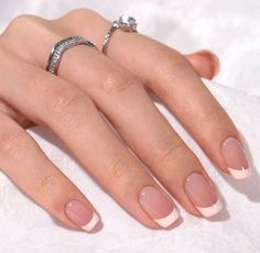 Experience the timelessly elegant yet daringly soft French manicure! Nails Kit Includes: 30 nails in 15 inclusive sizes Nail Glue/Gel Nail Tabs Double Sided Nail File Cuticle Stick Alcohol Pad Instructions Dimensions: Short; Shape: Square; Finish: Glossy HOW TO APPLY: Clean hands and let dry. Then, utilize the enclosed cuticle stick to push back cuticles, select the right nail for each finger, and set aside. Buff the nail surface with the double-sided file to create some texture. With the alcoho Gel French Tips, Short French Tip Nails, Radiate Confidence, Nagel Tips, French Tip Acrylic Nails, Adhesive Glue, Nails Short, French Tip Nails, Short Acrylic Nails