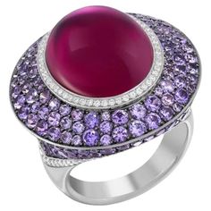 Ring 18K (Matching Earrings Available) Diamond 66-Round 57-0,41-4/6A Diamond 54-Round 57-0,19-4/6A Tourmaline 1-Oval-18,16ct Purple Sapphire 202-7,38 ct Size 7.5 USA NATKINA embraces the principles of modern Feminism — meaning, we believe a woman’s virtue is more than her external beauty. We believe that women deserve to feel proud of their achievements and should commemorate those achievements accordingly, be they a CEO, an Economist, a Designer or a new Mother. We believe that every single day Purple Ruby Ring For Formal Occasions, Exquisite Yellow Gold Amethyst Ring, Luxury Round Cabochon Amethyst Ring, Luxury Amethyst Cabochon Ring For Formal Occasions, Luxury Formal Cabochon Amethyst Ring, Luxury Formal Amethyst Cabochon Ring, Luxury Ruby Ring With Gemstone Accents, Luxury White Gold Amethyst Ring With Gemstone Accents, Formal Cabochon Amethyst Ring Fine Jewelry