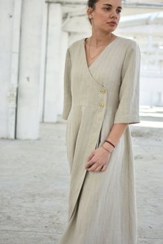 "Linen Wrap Dress, Striped Beige Dress, Bohemian Dress ◈ Stylish and chic fashion is our shared dream! You can be sure that this piece is made with a lot of love and craftsmanship. ◈ S I Z I N G ◈ The model wears size S. This item is available from XS to 2XL. Please, have a look at my Size Chart below before placing your order. ◈ D E L I V E R Y ◈ This item will be shipped in up to 5 days after your order was placed. We use Express worldwide shipping for all of our items. Shipping usually takes: Linen Loose Dress, Linen Wrap Dress, Cottagecore Dress, White Linen Dresses, Trendy Fall Outfits, Beige Dresses, Beautiful Skirts, Loose Dress, Bohemian Dress