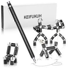 several black and silver objects in front of a white box with the word keifukuh written on it