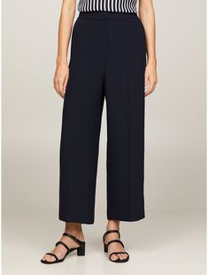 Tommy Hilfiger women's pant. These versatile cropped wide-leg pants work for the office and the hours beyond. The flat-front waistband offers a smooth silhouette, while the elastic band at the back offers comfort and the perfect fit.  Material: 72% Recycled Polyester (rpe). Tommy Hilfiger Store, Cropped Wide Leg Pants, The Hours, Neue Outfits, Twill Pants, Tommy Hilfiger Women, Work Pants, Elastic Band, The Office