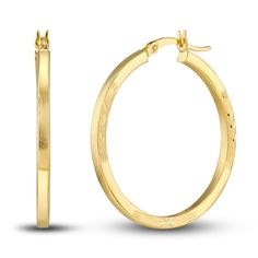 Dynamic 30mm round tubes are embellished with distinctive diamond-cut floral patterns in these playful women's hoop earrings. Fashioned in 14K yellow gold, the earrings secure in place with hinged backs. Engraved Hoop Earrings For Anniversary, Elegant Engraved Small Hoop Earrings, 14k Stamped Yellow Gold Huggie Earrings, Small Hoop Engraved Yellow Gold Earrings, Engraved Small Hoop Jewelry, Gold Huggie Earrings Stamped 14k, Engraved Small Hoop Earrings In Yellow Gold, Engraved Yellow Gold Hoop Earrings For Anniversary, Small Hoop Engraved Earrings