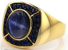 11x9mm 6.00ct oval cabochon blue Star sapphire with .90ctw round blue sapphire 18k yellow gold over sterling silver ring. Measures approximately .66"L x .71"W. Not sizeable. Finished under gallery. Web only Gold Sapphire Ring Oval Cabochon With Polished Finish, Fine Jewelry Sapphire Ring With Oval Cabochon, Oval Cabochon Sapphire Ring With Polished Finish, Gold Sapphire Cabochon Ring, Gold Sapphire Ring With Gemstone Accents, Gold Oval Cabochon Sapphire Ring Fine Jewelry, Luxury Oval Cabochon Sapphire Ring As Gift, Celestial Yellow Gold Sapphire Ring, Luxury Cabochon Sapphire Ring Gift