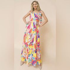 This Nwt Aura Maxi Dress In Size L Features A Colorful And Abstract Combo Print, With Stripes And A Rainbow Colors. The Dress Has A Square Neckline, 1.5" Tie Straps, And A 3-Tiered Skirt. The Sleeveless Dress Is Perfect For Summer, Fall, Or Spring Occasions, Such As Weddings, Parties, Or Casual Outings. The Dress Is Made Of Lightweight Woven Polyester Fabric And Features Adjustable Shoulder Straps, A Collarless Design, And Is Fully Lined. *This Aura Flowy Dress Is New From Red Dress Boutique Wit Multicolor Spaghetti Strap Sundress, Multicolor Sundress With Spaghetti Straps For Spring, Multicolor Spaghetti Strap Sundress For Spring, Flowy Multicolor Floral Print Sleeveless Dress, Multicolor Tiered Sundress Maxi Dress, Sleeveless Colorful Pattern Maxi Dress For Spring, Spring Sleeveless Sundress With Colorful Pattern, Colorful Pattern Sleeveless Sundress For Spring, Flowy Multicolor Sleeveless Dress For Spring