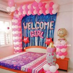 a bedroom decorated with balloons and decorations