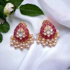 Silver Moissanite Polki Chandbali, Ruby Polki Earring, Wedding Jewelery, Moissanite Polki Earring, Ruby Earring Stud, Wedding Jewellery Gift *𝐀𝐛𝐨𝐮𝐭 𝐏𝐫𝐨𝐝𝐮𝐜𝐭* Product Code :- TE 1029 Product Type :- Stud Earring Product Weight :- 20.478 Gram Gemstone Used :-  Moissanite Polki, Labmade Ruby Material :- 925 Sterling Silver, Moissanite Polki, Labmade Ruby Size :- 4.7x2.1 Cm Intricate, hand-crafted, Pure Silver Polki Earrings, studded with high-quality Moissanite Polki comes with Clip-On, made in 92.5 silver with 22ct gold plating. The product comes with 92.5 silver stamping -Product can be made in gold as well. -If any product is not ready, It takes 2-3 weeks to make in pure silver -We also look forward to Bulk Orders. We shall consider special discount on Bulk Orders. Navrii (TM) b Festive Temple Jewelry Earrings For Anniversary, Meenakari Chandbali Jewelry For Anniversary, Chandbali Earrings With Stone Work For Anniversary, Round Earrings For Diwali Reception, Temple Jewelry Earrings For Diwali Anniversary, Anniversary Temple Jewelry Earrings For Diwali, Traditional Earrings For Anniversary And Diwali, Fusion Style Wedding Earrings With Latkans, Chandbali Bridal Earrings With Latkans For Anniversary