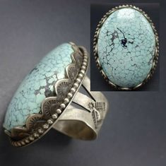 "ELGIN TOM NAVAJO RING DESCRIPTION: This spectacular ring is from celebrated Navajo artisan Elgin Tom. A gorgeous specimen of #8 turquoise is secure in hand-stamped scalloped bezel on a foundation of heavy gauge sterling silver. The wide, hand-stamped band holds this beauty perfectly in place on your finger. This extraordinary ring will be a treasured addition to your collection of fine Native American jewelry. MEASUREMENTS: Ring face measures 1 5/8\" x 1 1/4\" Cabochon measures 37mm x 27mm RING Antique Turquoise Sterling Silver Ring, Artisan Turquoise Ring Round Collectible, Artisan Round Turquoise Ring Collectible, Artisan Round Turquoise Collectible Ring, Stamped Turquoise Rings For Gifts, Untreated Round Turquoise Collectible Ring, Antique Silver Turquoise Ring With Patina, Antique Untreated Turquoise Jewelry, Southwestern Silver Turquoise Ring For Jewelry Making