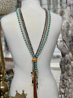 Turquoise Necklace With Round Beaded Chain, Bohemian Turquoise Necklaces, Turquoise Beaded Chain Long Necklace, Turquoise Long Necklace With Beaded Chain, Elegant Turquoise Beaded Lariat Necklace, Turquoise Beaded Chain Lariat Necklace, Turquoise Lariat Necklace With Beaded Chain, Elegant Long Beaded Turquoise Necklace, Turquoise Multi-strand Necklace With Dangling Beads