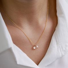 "A delicate rock crystal necklace is made to highlight Your Beauty. High-quality, flawless clear crystal quartz is neatly centered on the classic yet strong chain in the metal type and the length of your choice. Great as a gift for your beloved one on an April birthday or 10th Anniversary for your wife. Matching earrings: https://etsy.me/2lBd83i MATERIALS: * natural rock crystal (clear quartz) * tiny rondelles at the chain ends (except 14k Gold) * available 14k Gold Filled, Sterling Silver, 14k Rose Gold Crystal Necklace With Delicate Chain, Rose Gold Delicate Chain Crystal Necklace, Elegant Rose Gold Crystal Necklace With Delicate Chain, Elegant Rose Gold Crystal Necklaces With Adjustable Chain, Elegant Rose Gold Crystal Necklace With Adjustable Chain, Elegant Rose Gold Crystal Necklace With Round Pendant, Dainty Faceted Necklaces, Elegant Rose Quartz Round Crystal Necklaces, Elegant Rose Quartz Round Crystal Necklace