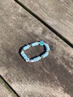 This is a preppy blue bracelet kids size Fun Blue Bracelets For Gifts, Fun Blue Beaded Bracelets For Gifts, Cute Blue Friendship Bracelets Gift, Cute Blue Beaded Friendship Bracelets, Cute Adjustable Turquoise Beaded Bracelets, Fun Blue Beaded Bracelets, Playful Blue Beaded Bracelets For Gifts, Playful Blue Beaded Bracelets For Gift, Playful Blue Beaded Bracelets As Gift