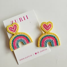 New Product Launch. Rainbow hearts earrings are now available on our website www.Zurii.ca Beaded Embroidery Earrings, Cloth Jewellery, New Product Launch, Diy Earrings Easy, Fairy House Crafts, Hearts Earrings, Diy Crafts Love