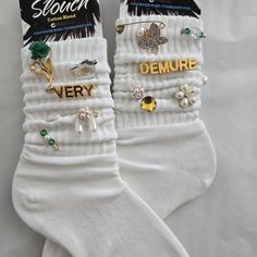 Charm, Junk, And Glam Socks Size: Adults 9-11 Color: White Add A Unique And Stylish Touch To Your Outfit With These Handcrafted, One-Of-A-Kind Slouch Socks! Featuring Elegant Charms Such As Pearl Accents, Rhinestones, And Delicate Gold-Plated Details, These Socks Combine Vintage Flair With Modern Charm. Gold Charms With “Very” And “Demure” Lettering Pearl And Crystal Flower Details Elegant Green And Gold Accents Soft, Comfortable Cotton Blend Material Perfect For A Casual Chic Or Playful Look Th Charm Socks, Slouch Socks Outfit, Bling Socks, Diy Fashion Projects, Ruffled Socks, Bling Shirts, Slouch Socks, Diy Socks, Cute Beanies