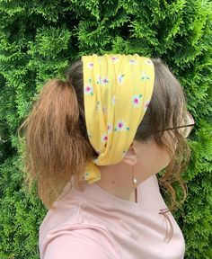 ook bright and sunny with this yellow floral knit medium width head covering that also converts to a headband! Its soft stretch knit fabric is comfortable for wearing any day of the week. Width measures about 9.25 inches from front edge going toward back of head. It can be worn as a headband or fully expanded as a medium head covering. Features matching fabric ties each measuring about 12 inches long. Front and back edges measure 18 inches from side to side. Hand wash and lay flat or hang to dry to preserve quality. Fabric has been pre-washed. Trendy Fitted Headband For Spring, Trendy Fitted Spring Headband, Casual Bandana Headband For Spring, Spring Beach Bandana Headband, Casual Bandana For Spring Season, Spring Floral Print Casual Bandana, Trendy Beach Bandana With Matching Headband, Casual Spring Floral Print Bandana, Summer Fitted Headwrap With Matching Headband