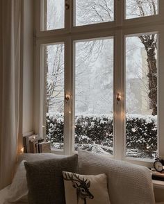 the instagram page on instagram com shows an image of a snowy day through a window