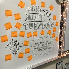 a bulletin board with sticky notes attached to it that says today is awesome and tuesday