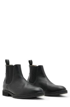 Elevate your closet staples with this sleek leather Chelsea boot featuring Western-inspired paneling at the heel and a rugged rubber sole. 5 1/2" shaft Lace-up style Leather and textile upper and lining/rubber sole Made in Portugal Casual Leather Chelsea Boots With Vibram Sole, Leather Chelsea Boots With Reinforced Toe, Fall Chelsea Boots With Moc Toe And Reinforced Toe, Classic High Ankle Work Boots With Rubber Sole, Rugged Round Toe Riding Boots, Casual Moto Boots With Reinforced Heel For Work, Rugged Riding Boots With Round Toe, Workwear Ankle-high Boots With Reinforced Toe, Western Chelsea Boots With Rubber Sole And Round Toe