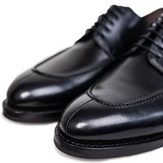 Ready to conquer the day? We’ve taken our timeless split toe derby silhouette and made it deep, dark, and black. This is a traditional, rich and refined shoe has an edge over the classic cap toe oxfords. We’ve also made this dress shoe with a Dainite sole so you can wear them all year round. Whether it's a formal events, or a night out with friends this is the perfect allrounder. Upper: Full-grain Italian leather Sole: Dainite lugged sole, British made* Construction: 360° Storm Goodyear welt (Re Timeless Goodyear Welted Lace-up Shoes With Round Toe, Timeless Oxford Shoes For Business, Classic Cap Toe Lace-up Shoes With Stitched Sole, Classic Lace-up Cap Toe Shoes With Stitched Sole, Fitted Goodyear Welted Cap Toe Derby, Classic Lace-up Shoes With Goodyear Welted Almond Toe, Classic Lace-up Shoes With Goodyear Welt And Almond Toe, Classic Goodyear Welted Lace-up Shoes With Almond Toe, Timeless Cap Toe Derby