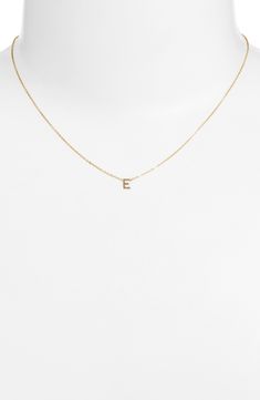 Personalize your stack with this layering-friendly necklace centered with a dainty pendant of your favorite initial filled with 14-karat yellow gold. 16" length 14k-gold fill Made in the USA Gold E Necklace, Everyday Yellow Gold Initial Pendant Chain Necklace, Dainty Initial Pendant Jewelry, Tarnish Resistant, E Initial Necklace, Gold-tone Initial Pendant Necklace, Letter K Necklace, Necklace With Letter, Gold-tone Tarnish Resistant Initial Pendant Necklace, K Necklace