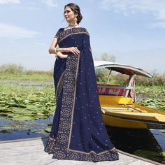 Navy Blue colored embroidered saree is made from Bluecherry Silk fabric which is highlighted with beautiful embroidered work.Comes along unstitched Crepe Silk blouse piece which you can customise as per your design/style.Occasion - You can wear this saree for party, special occasions, ideal for any fasionista. Style it up - Look glamorous in this traditional saree by (SUBHASH SAREES) Pair this saree with Ethnic Gold Jewellery, beautiful clutch to complete the look!! Saree For Party, Navy Blue Saree, Traditional Saree, Embroidered Saree, Blue Saree, Silver Work, Traditional Sarees, Blouse Piece, Gold Jewellery