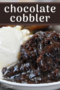 a white plate topped with chocolate cobbler next to ice cream on top of it