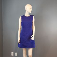 Side Cutouts Zipper On Back Mini Fully Lined Blue Fitted A-line Mini Dress, Royal Blue A-line Mini Dress, Fitted A-line Blue Mini Dress, Blue A-line Midi Dress Lined, Kate Spade A-line Dress For Work, Blue A-line Mini Dress For Casual Occasions, Elegant Blue Sleeveless Mini Dress, Blue Knee-length Mini Dress For Work, Blue Fitted Sleeveless Sheath Dress