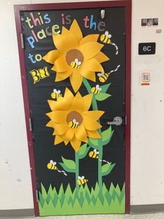 this is a door decorated with sunflowers and bees