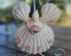 a close up of a small figurine on a table