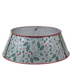 a lamp shade with holly and berries on it