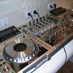 a dj's turntable sitting on top of a counter