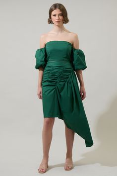 Be ready to stand out from the crowd in this Jadey Belen Ruched Midi Skirt. An extra stunning asymmetrical design fits perfectly in this ruched midi skirt. An invisible zipper was added in the side. You can wear it with the matching crop top and heels.- Ruched- High waist- Breathable- Asymmetrical- Color: EmeraldSize + Fit - Model is 5'8" and wearing size XS- Measurements taken from size S - Waist: 13 1/4"- Length: 37 1/2" Fabric Self:100%Cotton Style Number STS7063DR Ruched Midi Skirt, Straight Neckline, Asymmetrical Design, Comfy Fits, Cropped Top, Invisible Zipper, Cotton Style, Puff Sleeves, Smocking