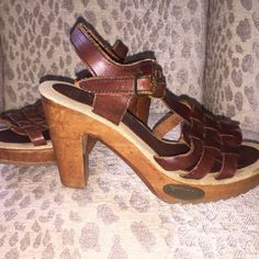 Vtg 1970’s Fanfares. New Never Worn, Handmade Brazilian Leather And Hand Carved Wood Heels. (Imperfections Are Its Character) New Clean Vintage Condition. Deep Oxblood, Burgundy, Rust Woven Huarache Top With A Brass Buckle Strap Around Ankle. Sole Is A Burlap Linens Fabric With No Wear Marks Either On The Sole Or Bottom Of Shoe. (There Are Some Scratches In The Wood From Being Stored In A Box Of Shoes But Could Be Buffed Out With Polish.) Rubber Grooved Sole, 4.25 Wooden Heel With Brass "Fanfares" Emblem Nailed Into Front Side Of Shoe. Labeled "Fanfares Made In Brazil 789 Ee 59 7m As403" Size 7 Vintage Round Toe Heels For Spring, Vintage Spring Heels With Round Toe, Spring Vintage Round Toe Heels, Vintage Stacked Heel Summer Heels, Retro Sandals With Leather Sole, Retro Leather Sandals With Leather Sole, Vintage Sandals With Block Heel And Heel Strap, Vintage Sandals With Heel Strap And Block Heel, Vintage Sandals With Stacked Heel For Spring