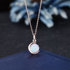 The moon engagement pendant necklace are a popular choice, represents I LOVE YOU TO THE MOON AND BACK , used to express the vastness of one's affection for another. HOW TO STYLE : it is the most versatile and elegant statement necklace for casual days in the office and nights out. It's your go-to statement piece whatever the occasion. It also can be personalized to show your uniqueness in the party, date, banquet. PERFECT FOR GIFTING: This alexandrite necklace is classic and never go out of style,  packaged in delicated gift box , It's a good choice of an anniversary, engagement, birthday, Mother's Day gifts, Christmas day, Thanksgiving Day, Valentine's Day gift for a couple, friend, family. AFTER-SALE SERVICE : 30 days money-back guarantee and for any reason, you are not satisfied with yo Wedding Fine Jewelry Necklace With Moon Charm, Fine Jewelry Moon-shaped Necklace For Anniversary, Fine Jewelry Moon Necklace For Anniversary, White Gold Moon Phase Necklace For Wedding, White Gold Crescent Necklace For Wedding, Crescent Moon Phase Necklace For Wedding, Wedding Necklaces With Moon Phase Round Pendant, White Gold Moon Charm Necklace For Wedding, White Gold Necklace With Moon Charm For Weddings