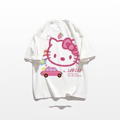 Stay Cute and Stylish with Hello Kitty in our Kawaii Sanrio Hello Kitty T-Shirt! 🐱👕 🌟 Adorable and Playful: This t-shirt is perfect for adding a touch of charm and cuteness to your everyday outfits. Ideal for fans of Hello Kitty and those who adore the Sanrio universe. ✨ Superior Quality: Crafted with precision to ensure top-notch quality. Designed with a comfortable fit and featuring a delightful Hello Kitty design. 💫 Hello Kitty Charm: Enjoy the delightful presence of Hello Kitty, the belo Kawaii Cotton T-shirt For Streetwear, Trendy Cotton T-shirt With Hello Kitty Print, Casual Pink Hello Kitty T-shirt, Harajuku Style Tops With Hello Kitty Print, Harajuku Style Hello Kitty Print Top For Streetwear, Playful Hello Kitty T-shirt For Summer, Harajuku Style Hello Kitty Cotton Tops, Harajuku Hello Kitty Print Cotton Tops, Harajuku Hello Kitty Crew Neck Top