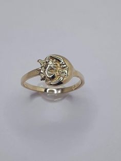 This stunning Sun/Moon ring has been carefully crafted in warm 10k yellow gold. This ring will make a great any ocassion gift/birthday/Christmas gift. This delicate ring will not go unnoticed. All of my jewellery is handmade from scratch one item at a time. A tracking shipping number will be provided to you once the ring has been mailed.  Ring Measurements and Materials: Ring is size 7 but can be resized at no extra cost and will be shipped to you in an elegant gift box. Ring Weight: 1.8 grams R Moon And Sun Ring, Moon Rings, Ring Moon, Sun Ring, 10k Gold Ring, Moon And Sun, Box Ring, Moon Ring, Delicate Rings