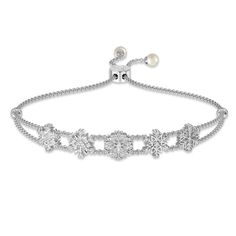 Snowflakes from above are loved ones sending their love…This elegant silver-plated bracelet features a remarkable 95 simulated diamonds.Two snowy white pearls grace the ends of the bracelet.The words “Kisses from Heaven” are engraved on the bolo slide, serving as a reminder of the love your loved one sends from above.The poem “Kisses from Heaven” by beloved poet Deborah J. Birdoes is included on a keepsake card that you can tuck in a special place to see each day. Kisses From Heaven, Bolo Bracelet, The Poem, Silver Plated Bracelet, Danbury Mint, Love Your, Pearl White, Silver Plate, Diamond Necklace