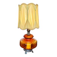 a table lamp with a yellow shade on it