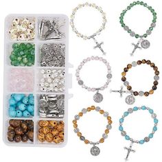 several different types of beads and charms in a plastic container