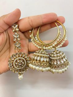 Elevate your style quotient with this gorgeous Mirror hoop earrings set. Made with high-quality materials and crafted with intricate mirror detailing, these mirror jumka hoops are a must-have for any fashion-forward woman who also loves traditional accessories. About this Mirror Hoop Earrings Set - The elegant hoops to fit your everyday attire need - A perfect accessory to wear on any occasion - You can go for these hoop earrings with any ethnic attire - Perfect for jewellery-loving females Dime Meenakari Earrings For Marriage And Festivals, Festive Intricate Design Earrings For Wedding, Festive Wedding Earrings With Intricate Design, Festive Kundan Earrings For Marriage, Chandbali Earrings For Marriage On Diwali, Chandbali Earrings For Marriage And Diwali, Festive Chandbali Earrings For Marriage, Wedding Chandbali Earrings For Diwali, Festive Meenakari Earrings For Marriage