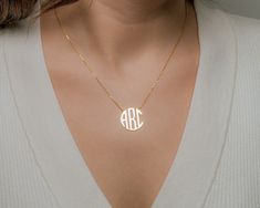 Monogram Initials Necklace, Family Name Necklace ♥ T H E ∙ P E R F E C T ∙ G I F T Monogram Necklace will be handmade with your desired custom name in this dainty font. You will love this dainty custom monogram necklace. This necklace can be a great gift for a girlfriend , family member or for yourself. ♥ D A I N T Y ∙ M O N O G R A M ∙ N E C K L A C E The most unique jewelry you can find, perfect gift for you and your loved one. * Material: High Quality Solid 925 Sterling Silver * Monogram Char Engraved Initial Necklace For Mother's Day Anniversary, Engraved Initial Necklace For Anniversary On Mother's Day, Initials Round Pendant Necklace For Mother's Day, Minimalist Initials Name Necklace As Gift For Mom, Yellow Gold Monogram Name Necklace For Mother's Day, Mother's Day Initials Round Pendant Necklace, Monogrammed Yellow Gold Name Necklace For Mother's Day, Classic Personalized Initial Necklace For Mother's Day, Monogram Jewelry For Mother's Day Anniversary