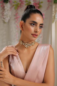 The floral Kundan choker is a celebration of the rich tradition of India that is beautifully handcrafted by the artisans to bejewel your neckline with a belief to balance the ancient and modern concepts of Indian jewelry. The Kundan choker made on 22K gold plating has a replica of Bollywood jewelry, perfect for the women who believe in carrying the light of their heritage. Add this beauty to your jewelry wardrobe and pair it up with a delicate outfit to create a bold look. Necklace Closure - Adj Elegant Tilla Choker For Party, Formal Bridal Choker With Tilla, Elegant Party Choker With Tilla Detailing, Formal Kundan Choker Necklace With Tilla, Elegant Kundan Choker Necklace With Cutdana, Traditional Kundan Choker Necklace For Formal Events, Festive Bridal Choker Necklace For Formal Occasions, Festive Bridal Choker For Reception, Festive Formal Bridal Choker Necklace