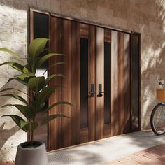 a bicycle parked next to a building with wooden doors