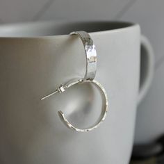 Sterling Silver Wide 1/2" Hammered Hoop Earrings – AccentYourself Simple Silver Earrings, Spiral Jewelry, Hammered Silver Jewelry, Jewellery Photography Inspiration, Silver Jewlery, Hammered Jewelry, Handmade Silver Jewellery, Metalwork Jewelry, Silver Flower Earrings