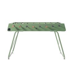 a green table with small dogs on it and legs that are bent to the side