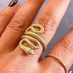 New to the collection! 💚🐍 And be sure to take advantage of the 10% off summer sale- discount automatically applied upon checkout towards any minimum purchase of $150.00 Gold Snake Shape Rings For Anniversary, Adjustable Gold Snake Ring, Luxury Snake Ring As A Gift, Gold Fine Jewelry Snake-shaped Ring, Gold Snake-shaped Ring For Anniversary, Gold Snake Open Ring Fine Jewelry, Gold Open Snake Ring Fine Jewelry, Handmade Gold Snake Ring, Gold Snake Ring As Gift