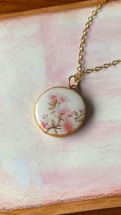 Beautiful #cherryblossom #necklace for #mimi on #mothersday Rose Gold Flower Pendant Charm Necklace For Wedding, Round Birth Flower Charm Necklaces For Weddings, Wedding Jewelry With Flower Charm Pendant, Wedding Jewelry With Flower Charm Round Pendant, Wedding Jewelry With Round Flower Charm Pendant, Rose Gold Necklace With Flower Charm For Keepsake, Elegant White Necklace With Pressed Flowers, Rose Gold Pendant Charm Necklace For Wedding, Delicate Round Pink Necklace