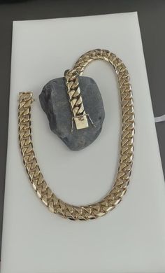 Cuban Link Necklace Gold, Luxury Fine Jewelry Cuban Link Necklace, Luxury Gold Cuban Link Necklace For Everyday, Luxury Cuban Link Fine Jewelry Necklace, Luxury Classic Cuban Link Chain Necklace, Luxury Gold Cuban Link Everyday Necklace, Luxury Jewelry Cuban Link With Solid Construction, Luxury Gold Cuban Link Necklace With Oval Links, Luxury Elegant Round Cuban Link Necklace