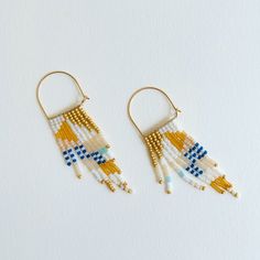 Every piece of Alice Rise jewelry is uniquely made by hand. String by string, bead by bead- all of her work is meticulously done using Japanese glass beads and 14K Gold components. The vibrant colors used throughout her designs are a beautifully way to remind us that our true nature is to be joyful, vibrant and free. These handwoven fringe earrings are a delightful way to add some color and life to that gorgeous outfit of yours! Bright and cheerful enough for the day or dazzling and dainty for a Peach Picnic, True Nature, Loom Weaving, Summer Picnic, Gold Wire, Fringe Earrings, Jewelry Projects, Good Time, Hand Beading