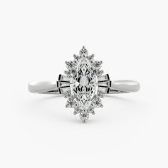 a white gold ring with an oval cut diamond surrounded by small round diamonds on the band